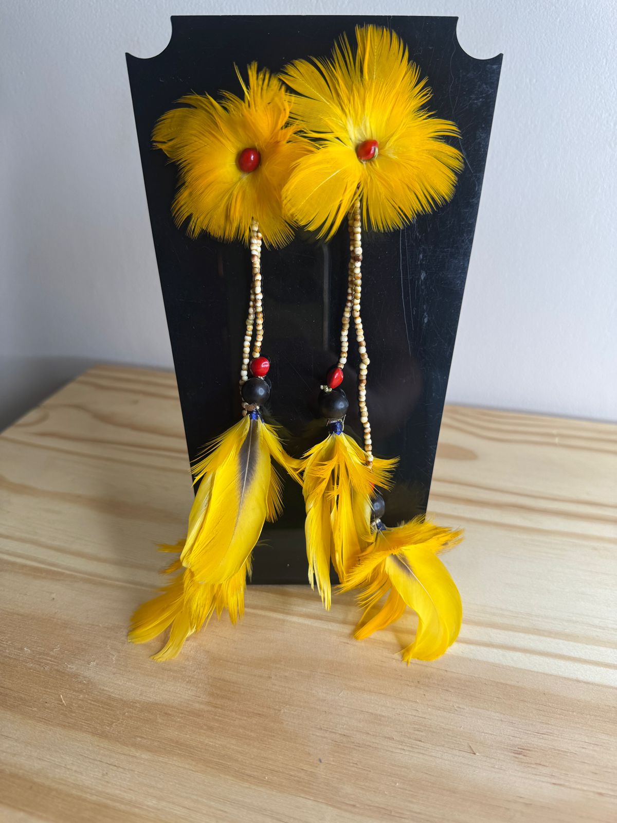 BRINCO XERENTE PENA AMARELA